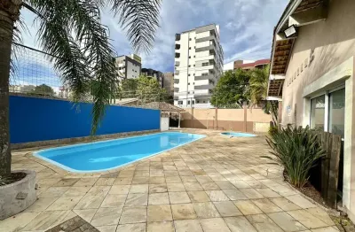 Casa em condomínio fechado no centro de canoas com 4 dormitórios sendo 1 suíte e 2 vagas de garagem. aceita financiamento e fgts.
