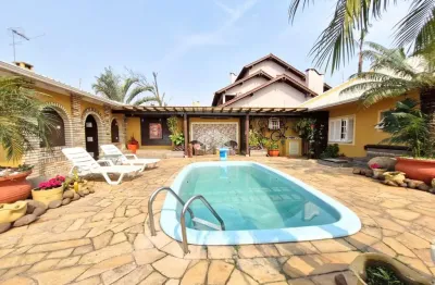 Casa térrea com 210m², 3 dormitórios/quartos sendo 1 suíte no bairro moinhos de vento, canoas