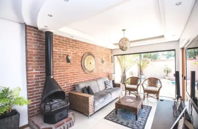 Casa com 4 dormitórios, 2 suítes, churrasqueira, piscina, próxima ao parkshopping canoas, no bairro bela vista, em canoas. aceita financiamento