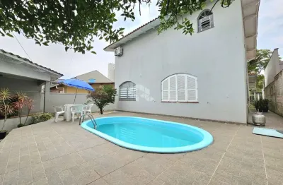Casa sobrado 4 dormitórios, suíte, 2 banheiros sociais, sacada, piscina, churrasqueira, 5 vagas. localizado no bairro marechal rondon