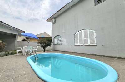 Casa sobrado à venda no bairro marechal rondon em canoas, 4 dormitórios, piscina e amplo pátio - aceita financiamento e fgts