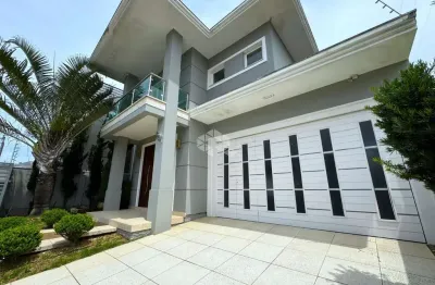 Casa com 3 dormitórios, sendo 3 suítes, 4 vagas, no bairro marechal rondon em canoas - rs.
