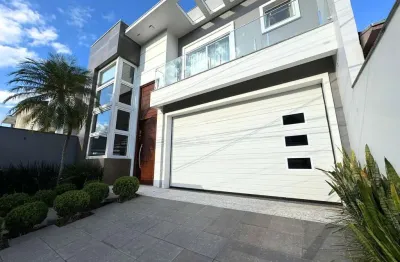 Casa mobiliada com 3 dormitórios, 2 suítes, vaga coberta para 2 veículos, no bairo estância velha, na cidade de canoas. aceita financiamento bancário.
