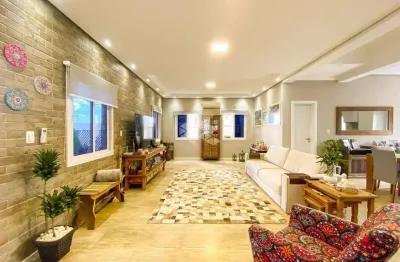 Sobrado 3 dormitórios, suíte com banheira, espaço gourmet,  4 vagas, piscina com deck no bairro igara na cidade de canoas.