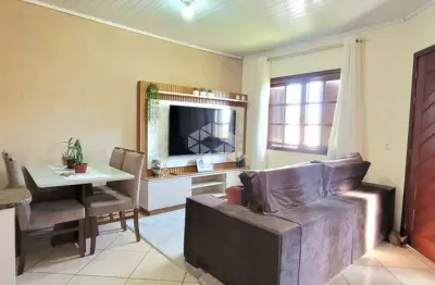 Casa à venda no bairro olaria em canoas - 2 dormitórios, 3 vagas, com financiamento e uso de fgts