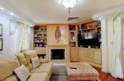 Casa sobrado 6 dormitórios 2 suítes, sendo uma com 80m², 8 vagas cobertas, ar central, piscina, salão de festas, amplo jardim, nossa senhora/canoas