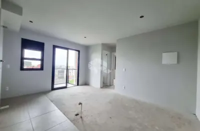 Apartamento com posição solar e vista privilegiada sendo 2 dormitórios, cozinha americana, sacada com churrasqueira e 1 vaga coberta no centro canoas