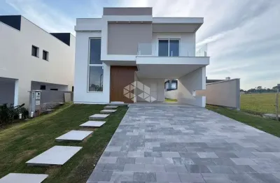 Casa em condominio 3 dormitorios e 3 suítes,  4 vagas de garagem, lareira, churrasqueira, sacada, piscina aquecida, reservas do lago/nova santa rita