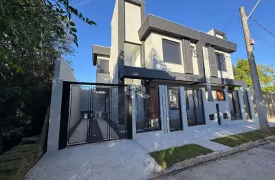Casa estilo sobrado com 03 quartos, 01 suíte no bairro moinhos de vento em canoas