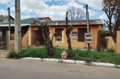 Venda de terreno com 3 casas - ideal para moradia ou renda