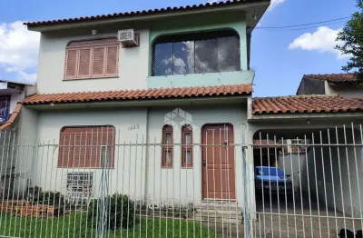 Casa com 3 dormitorios e  suite no bairro estância velha canoas