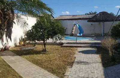 Casa com 3 quartos à venda na A Cinco, 18, Guajuviras, Canoas