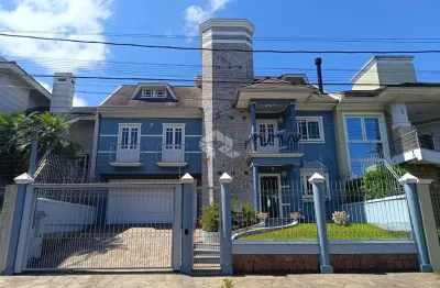 Casa com 4 quartos à venda na Rua Grécia, 80, Marechal Rondon, Canoas