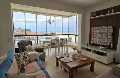 Cobertura  03 quartos no centro  em capão da canoa quadra da beira mar