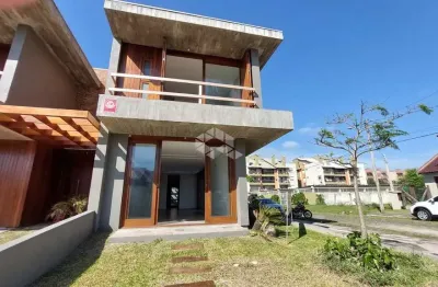 Sobrado de alto padrão em capão novo - a 50m da praia!