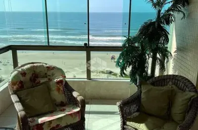 Apartamento 03 dormitórios, 1 suíte, 2 boxes, mobiliado e decorado, frente para o mar, no bairro centro, em capão da canoa.