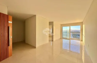 Apartamento de 2 dormitórios com vista definida e liberada para serra e box/vaga de garagem no centro de capão da canoa