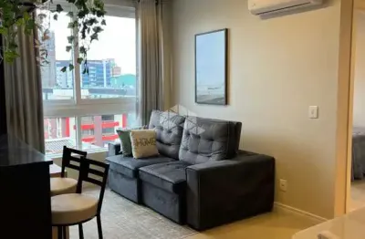 Apartamento novo com 02 dormitórios(sendo 01 suíte),mobiliado, em capão da canoa/rs.