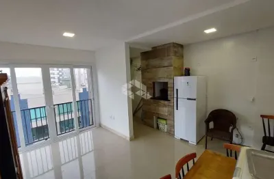 Sofisticação e vista para o pôr do sol: apartamento novo com 2 dormitórios  com suíte no centro de capão da canoa.