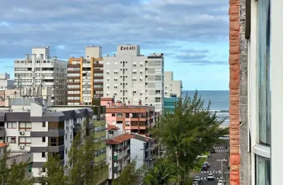 Apartamento 2 dormitórios no centro de capão com vista mar mobiliado
