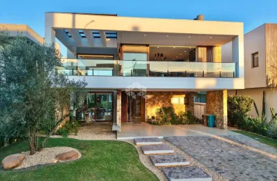 Casa de luxo no capão ilhas compost por 04 quartos/suítes, mobiliada e decorada.