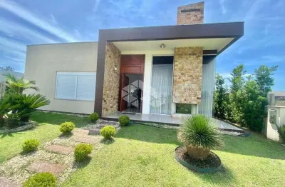 Casa com 3 dormitórios, 3 suítes,  no condomínio dubai, capão da canoa/rs