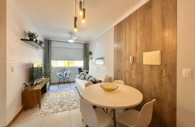 Apartamento mobiliado com 1 dormitório e box a duas quadras do mar