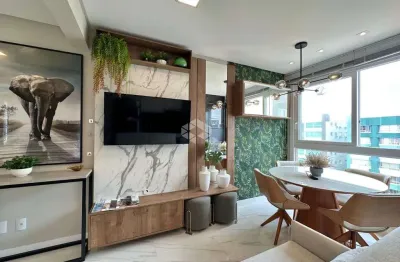 Apto completo sendo loft , finamente mobiliado e decorado , split instalado, living integrado,cozinha americana equipada, gás central ,capão da canoa!