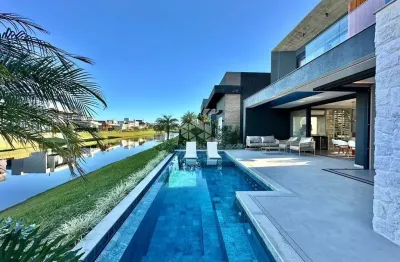 Sobrado com 4 suítes mobiliado e decorado a beira lago no capão ilhas resort