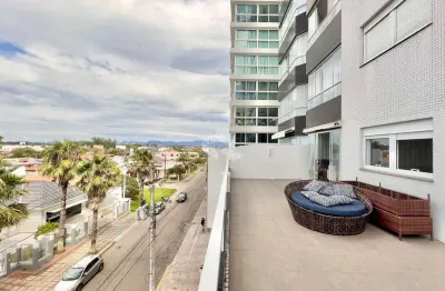 Apartamento com 3 dormitórios sendo 1 suíte mobiliado com terraço  e box/vaga de garagem na zona nova em capão da canoa