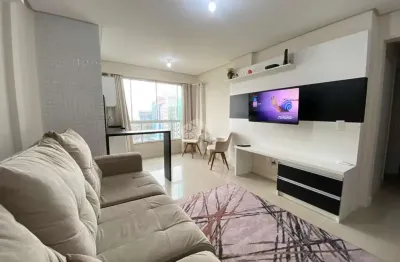 Apartamento de 2 dormitórios mobiliado com box de garagem junto a praça israelita na zona nova em capão da canoa