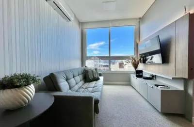 Apartamendo de 2 dormitórios mobiliado e decorado com 1 vaga/box de garagem  no bairro navegantes em capão da canoa