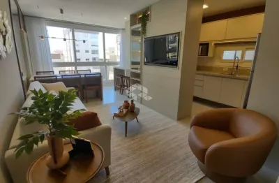 Apartamento 2 dormitórios 1 suíte mobiliado com box/vaga de garagem na zona nova em capão da canoa