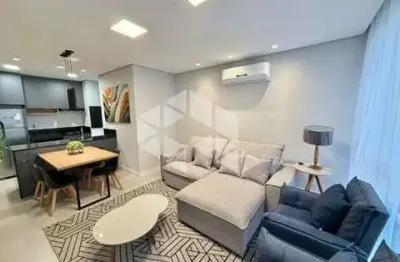Apartamento de 2 dormitórios (1 suíte) mobiliado e decorado c/box vaga de garagem no bairro navegantes em capão da canoa