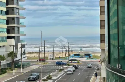 Apartamento de 3 dormitórios mobiliado c/ vista mar e box de garagem na navegantes em capão da canoa