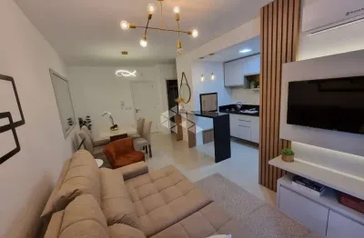 Apartamento 2 quartos 1 suíte mobiliado com box/vaga de garagem na zona nova em capão da canoa
