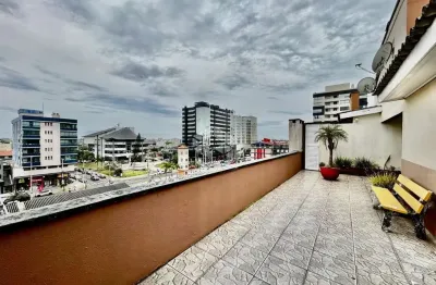 Cobertura com 3 dormitórios sendo 2 suítes totalmente mobiliada e amplo terraço privativo + box/vaga de garagem e depósito no centro de capão da canoa