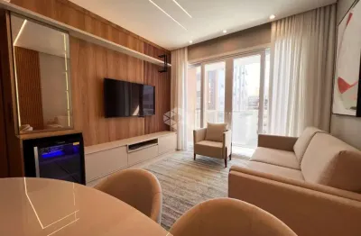 Apartamento com 2 dormitórios 1 suíte mobiliado com box/vaga de garagem na zona nova em capão da canoa