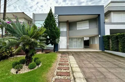 Sobrado com 5 suítes totalmente mobiliado e equipado no condomínio fechado condado de capão !!!