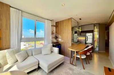 Apartamento com 2 dormitórios 1 suíte mobiliado com box/vaga de garagem no bairro navegantes em capão da canoa