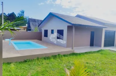 Casa com 2 dormitórios mobiliada com garagem fechada em arroio teixeira