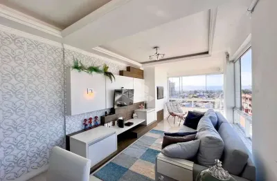 Apartamento de 2 dormitórios mobiliado e decorado com box/vaga de garagem na av. ubirajada no bairro navegantes em capão da canoa