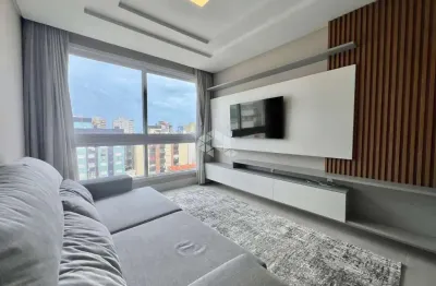 Apartamento de 2 dormitórios (sendo 1 suíte) mobiliado com box/vaga de garagem no centro de capão da canoa