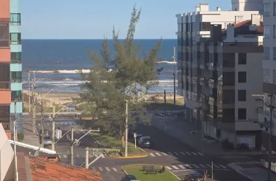Apartamento de 3 dormitórios mobiliado com vista mar e box duplo no centro de capão da canoa