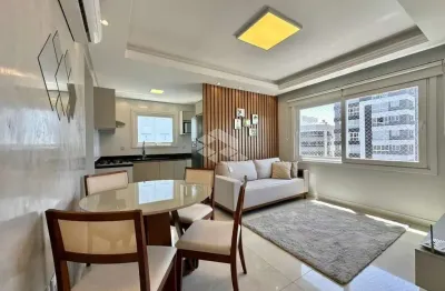 Apartamento de 2 quartos 1 suíte mobiliado com box/vaga de garagem em capão da canoa