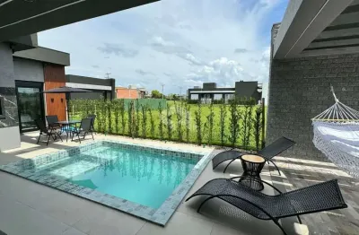 Casa em condomínio com 4 suítes mobliada e com piscina em capão da canoa