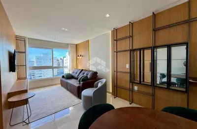 Apartamento novo com 2 dormitórios/quartos 1 suíte mobiliado com box/vaga de garagem em capão da canoa