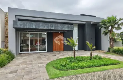 Casa em condomínio nova com 4 suítes mobiliada com piscina em capão da canoa
