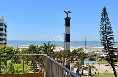 Cobertura com 3 dormitórios sendo 1 suíte mobiliada com vista mar e vaga de garagem em capão da canoa