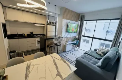 Apartamento de 2 dormitórios sendo 1 suíte mobiliado com bxo/vaga de garagem em Capão da Canoa